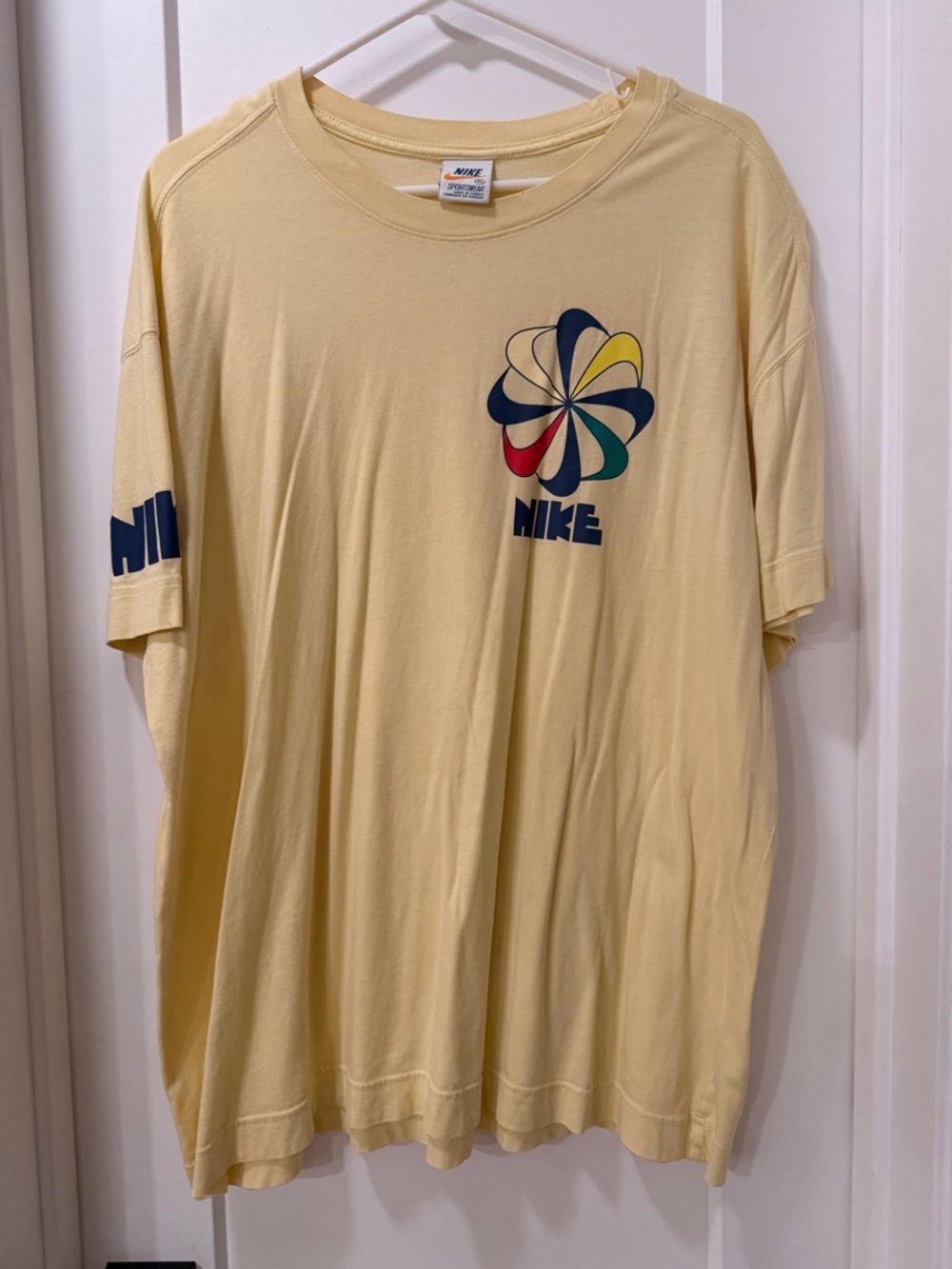 Nike Men’s Vintage Short Sleeve Graphic T-Shirt — Pale Yellow